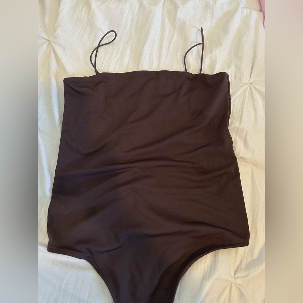 Brown body suit